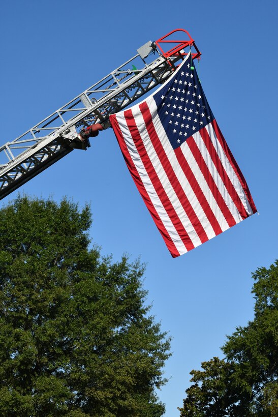 IMAGE: The U.S. Flag flies in the breeze during the 9/11 Remembrance held ahead of the 20th anniversary.