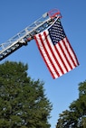 IMAGE: The U.S. Flag flies in the breeze during the 9/11 Remembrance held ahead of the 20th anniversary.
