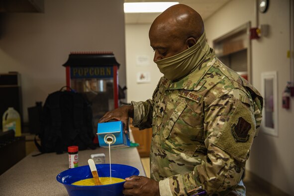 Lt. Col. Dwane Jones, Task Force-Holloman chaplain, prepares breakfast for the Airmen working at Aman Omid Village in Holloman Air Force Base, New Mexico on Sept. 13, 2021. The Department of Defense, through U.S. Northern Command, and in support of the Department of State and Department of Homeland Security, is providing transportation, temporary housing, medical screening, and general support for at least 50,000 Afghan evacuees at suitable facilities, in permanent or temporary structures, as quickly as possible. This initiative provides Afghan evacuees essential support at secure locations outside Afghanistan.(U.S. Army photo by Pfc. Anthony Sanchez)
