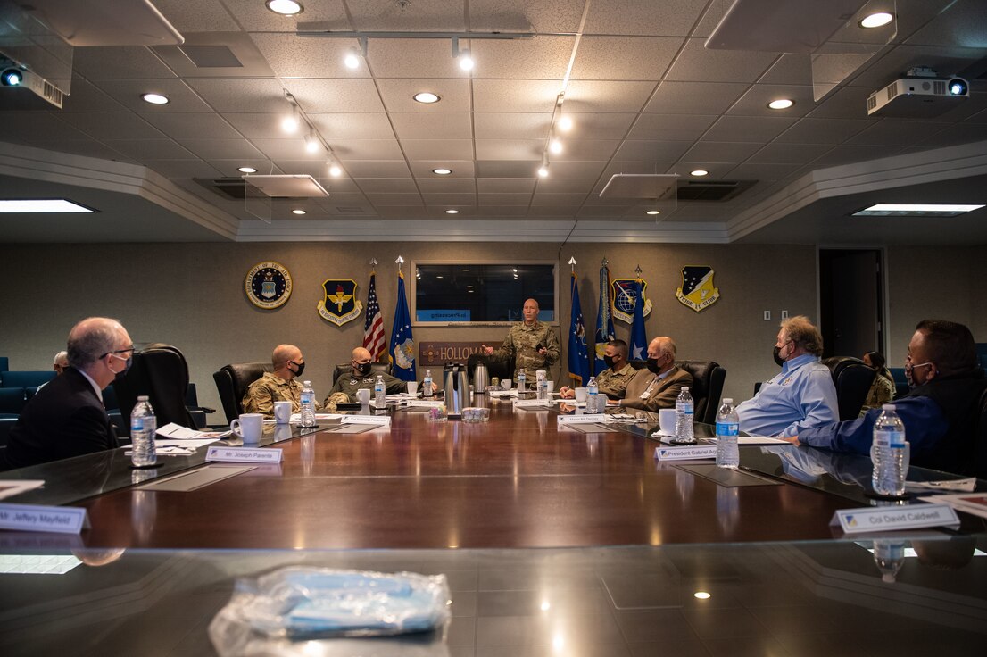 Brig. Gen. Daniel Gabrielli, center, Task Force-Holloman commander, speaks with local city mayors, and a leader from the Mescalero Apache Tribe, about the mission of TF-H and their accomplishments at Holloman Air Force Base, New Mexico, Sept. 9, 2021. The Department of Defense, through U.S. Northern Command, and in support of the Department of State and Department of Homeland Security, is providing transportation, temporary housing, medical screening, and general support for at least 50,000 Afghan evacuees at suitable facilities, in permanent or temporary structures, as quickly as possible. This initiative provides Afghan evacuees essential support at secure locations outside Afghanistan. (U.S. Air Force photo by Staff Sgt. Kenneth Boyton)