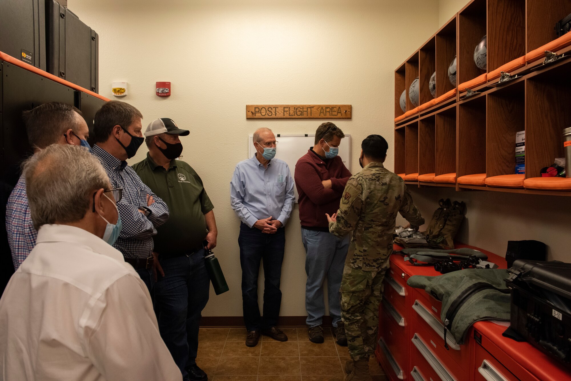A U.S. Air Force Airman from the 391st Fighter Squadron educates community leaders on Aircrew Flight Equipment during a Treasure Valley Partnership tour on Mountain Home Air Force Base, Idaho, Sept. 9, 2021. The tour showcased the importance of our mission here to build strong relationships within the community.