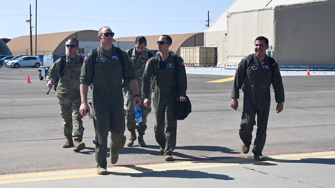Leadership of exercise agile combat employment reaper from Holloman Air Force Base walk to a C-17 Sept. 8, 2021, Holloman AFB, New Mexico.