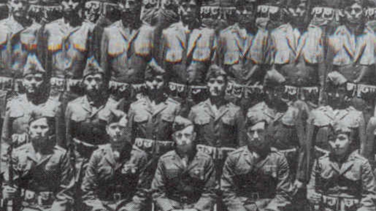 Troops in rows pose for photo