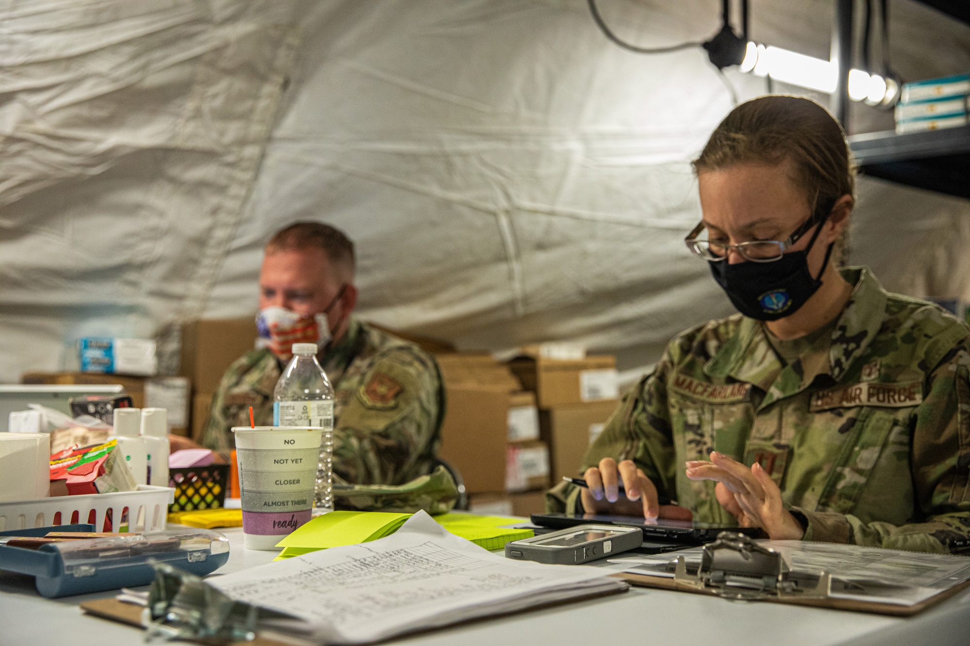 Expeditionary Medical Support System Airmen attached to Task Force-Holloman conduct medical procedures in support of Operation Allies Welcome at Holloman Air Force Base, New Mexico, Sept. 10, 2021. The Department of Defense, through U.S. Northern Command, and in support of the Department of State and Department of Homeland Security, is providing transportation, temporary housing, medical screening, and general support for at least 50,000 Afghan evacuees at suitable facilities, in permanent or temporary structures, as quickly as possible. This initiative provides Afghan evacuees essential support at secure locations outside Afghanistan. (U.S. Army photo by Pfc. Anthony Sanchez)