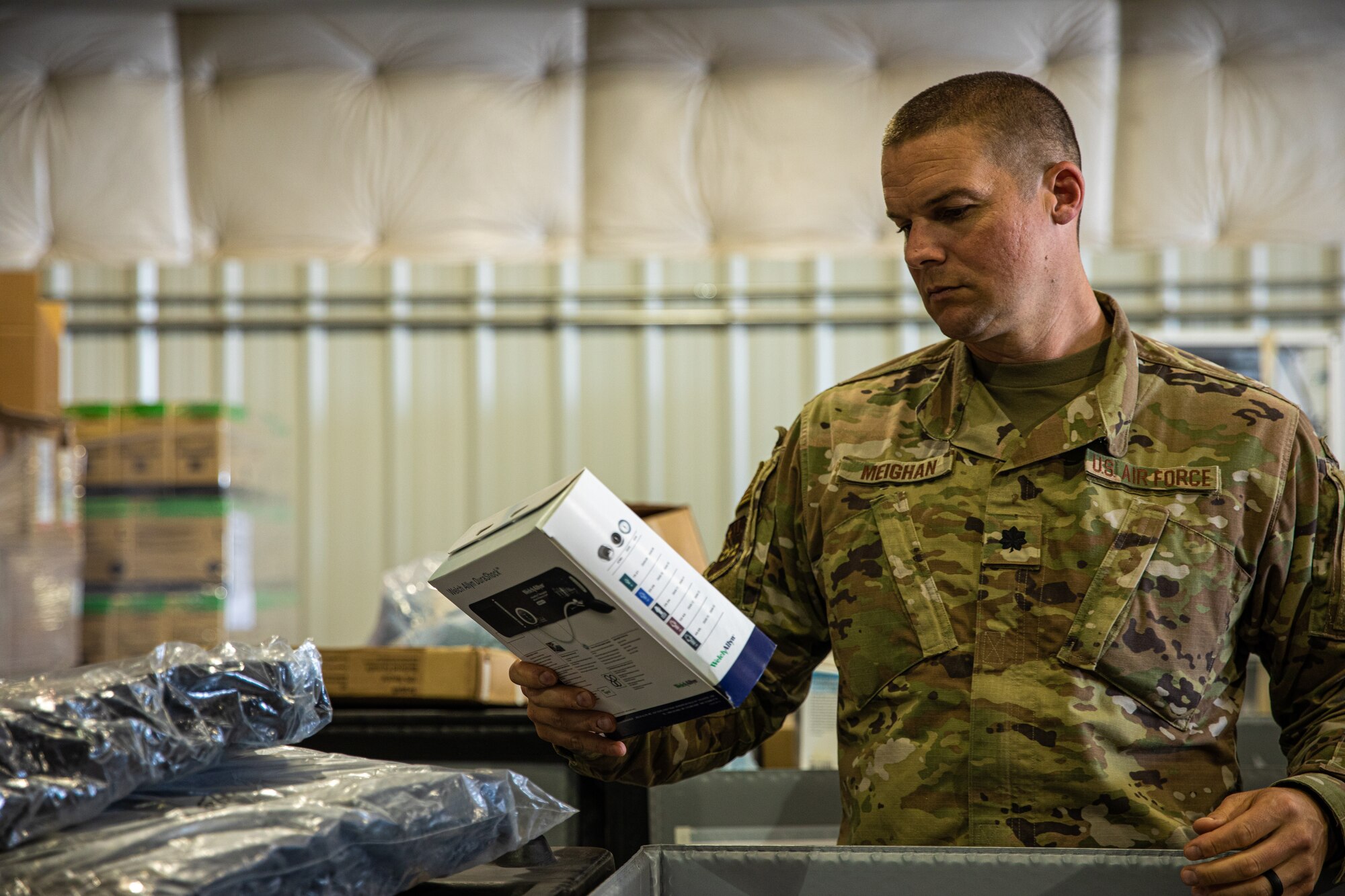 An Expeditionary Medical Support System Airman attached to Task Force-Holloman organizes medical supplies in support of Operation Allies Welcome at Holloman Air Force Base, New Mexico, Sept. 10, 2021. The Department of Defense, through U.S. Northern Command, and in support of the Department of State and Department of Homeland Security, is providing transportation, temporary housing, medical screening, and general support for at least 50,000 Afghan evacuees at suitable facilities, in permanent or temporary structures, as quickly as possible. This initiative provides Afghan evacuees essential support at secure locations outside Afghanistan. (U.S. Army photo by Pfc. Anthony Sanchez)