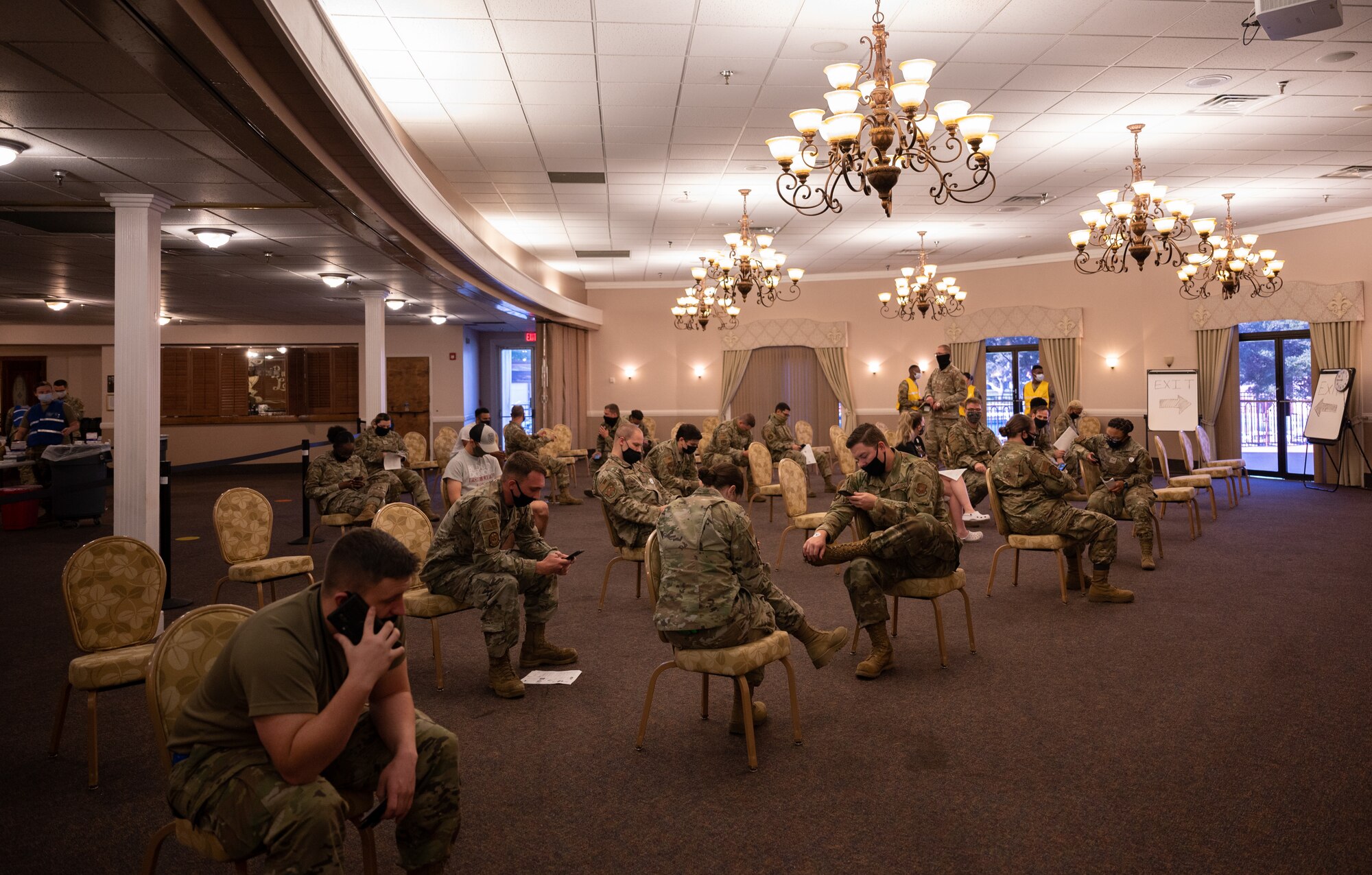 Service members were advised to wait 15 minutes before proceeding with their day just in case they had an adverse reaction to the vaccine.