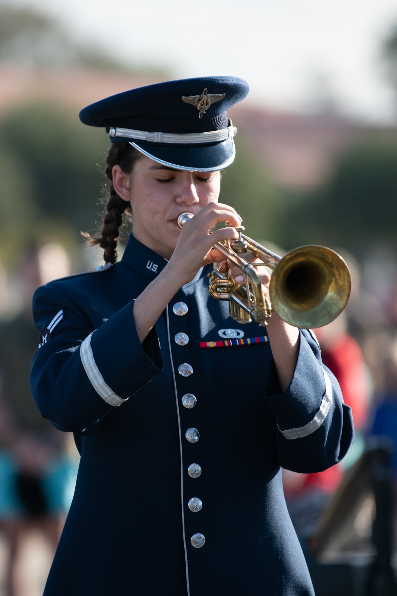 Airman playing trumpet