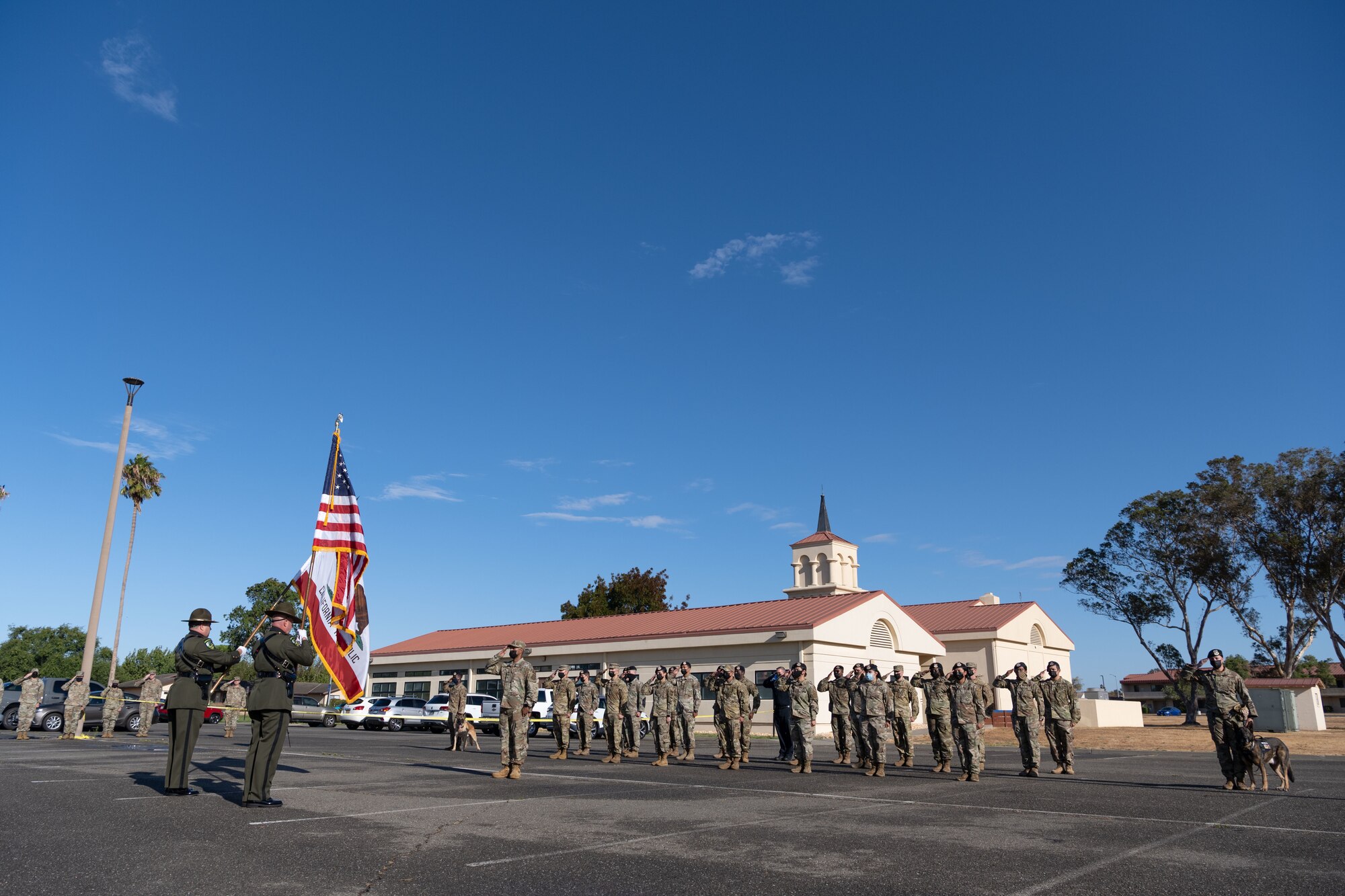 Airmen saluting