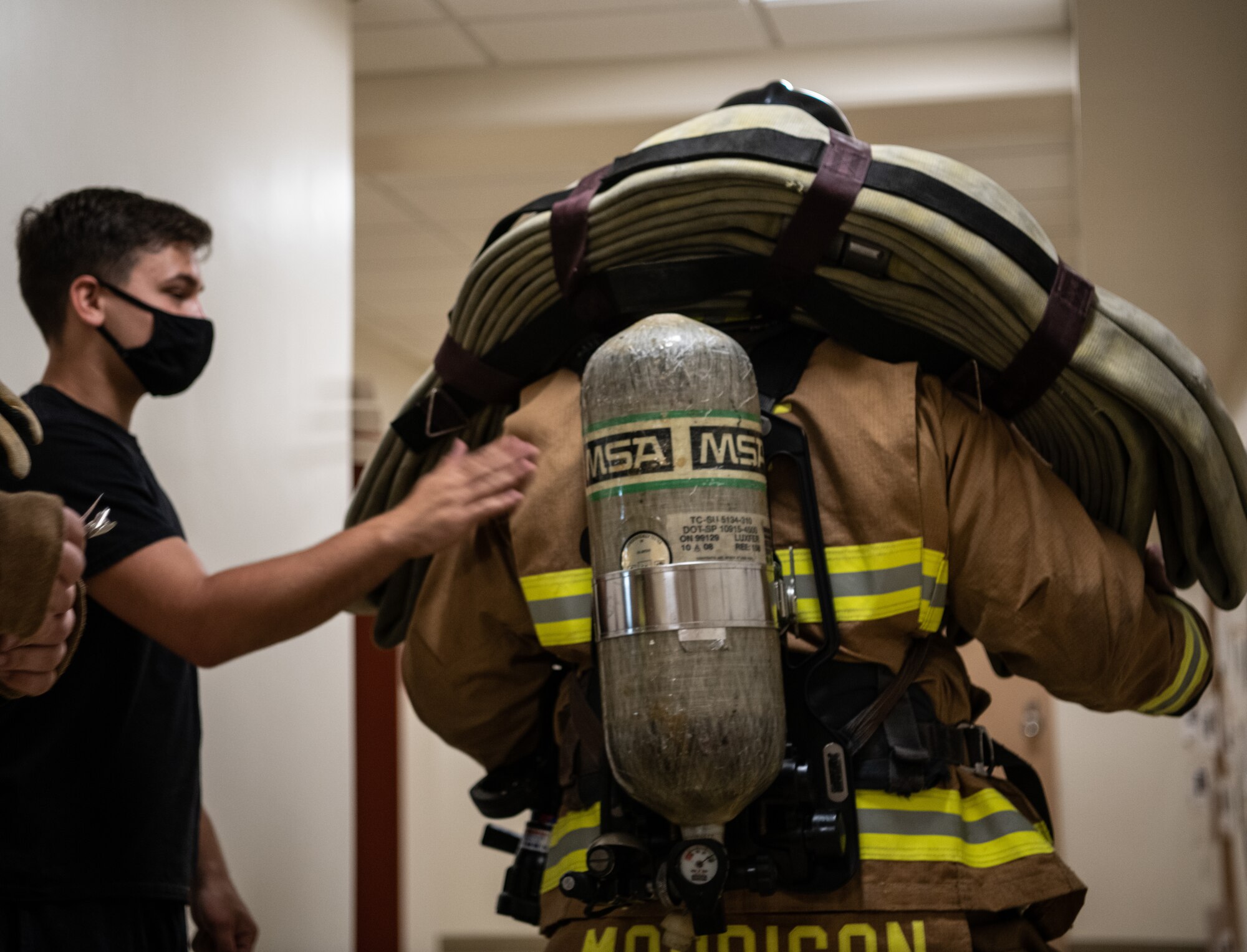 Firefighters honor fallen first responders in 9/11 memorial stair climb.