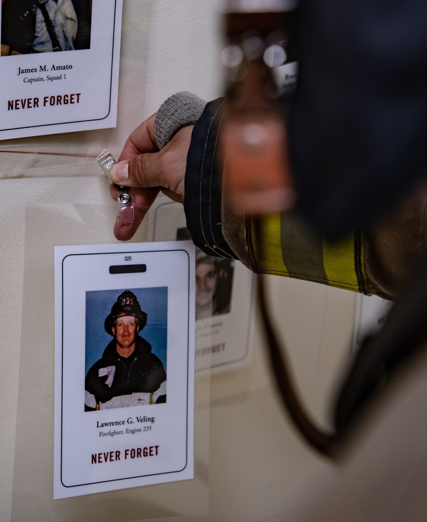 Firefighters honor fallen first responders in 9/11 memorial stair climb.