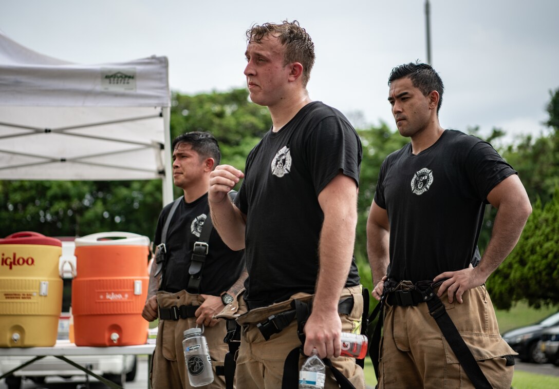 Firefighters honor fallen first responders in 9/11 memorial stair climb.