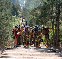 Firefighters climb the Manitou Incline