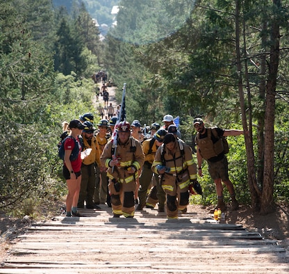 Firefighters climb the Manitou Incline