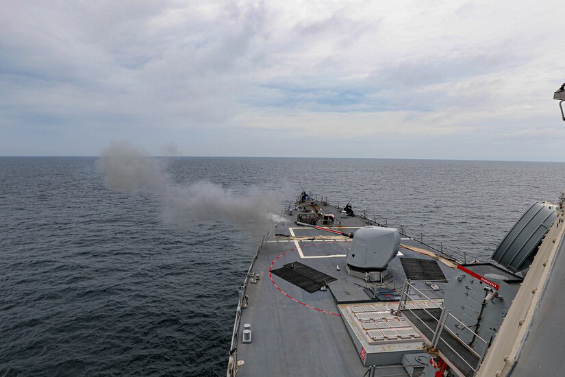 A ship transits a body of water.