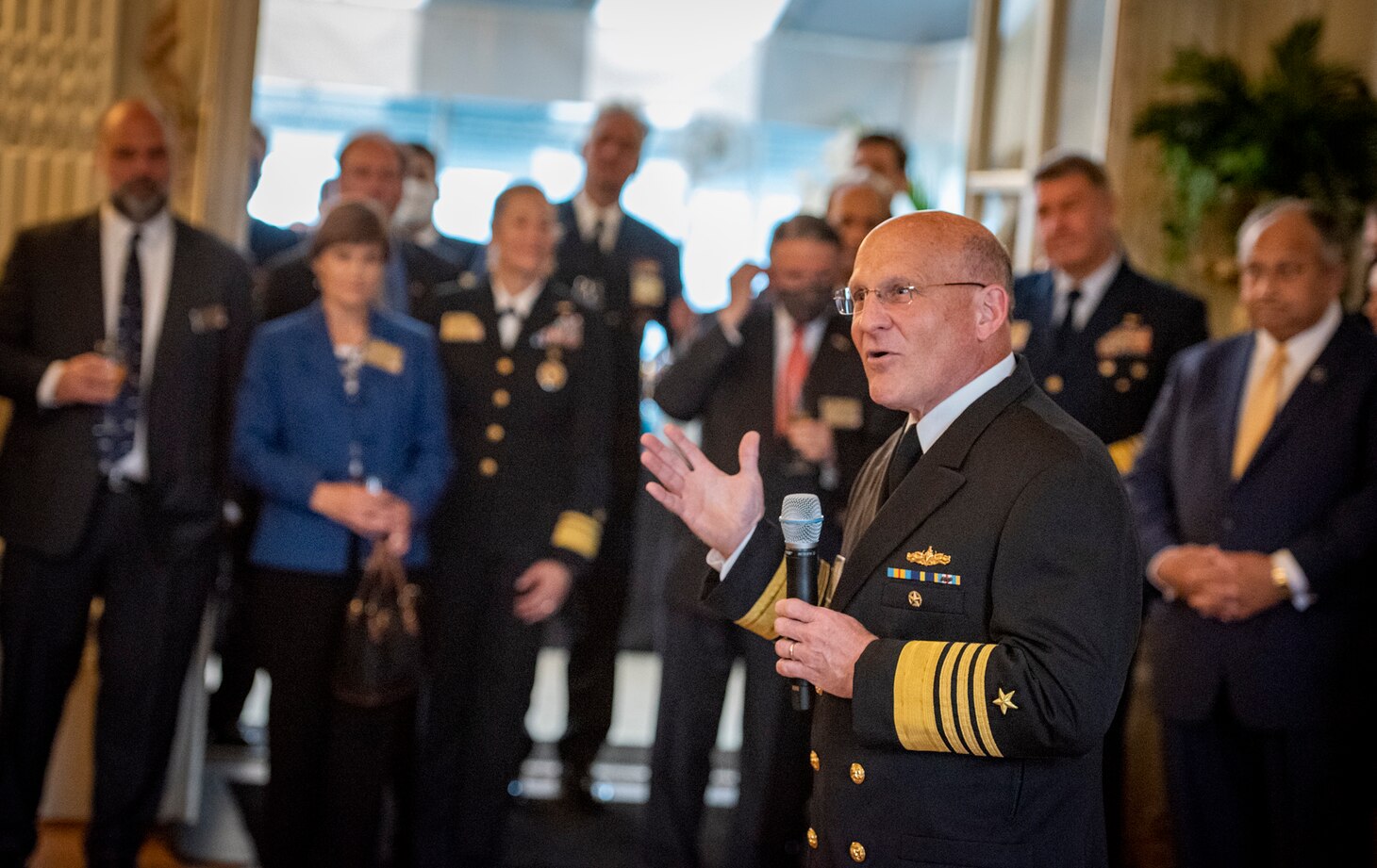 Chief of Naval Operations (CNO) Adm. Mike Gilday speaks with international delegates during the International Seapower Symposium welcome reception.