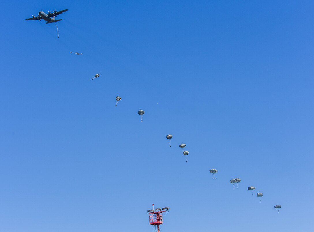 U.S. Paratroopers from the 173rd Airborne Brigade jump out of a U.S. Air Force C-130 Hercules during exercise Agile Wyvern at Cerklje ob Krki Air Base, Slovenia, Sept. 8, 2021. Sky Soldiers of 2nd Battalion, 503rd Parachute Infantry Regiment “The Rock,” merged with the 31st Fighter Wing’s Agile Wyvern operations as part of their own separate exercise to show small unit proficiency, tactical competence and to solidify partnerships with the Slovenian 74th Infantry Regiment. (U.S. Air Force photo by Senior Airman Brooke Moeder)