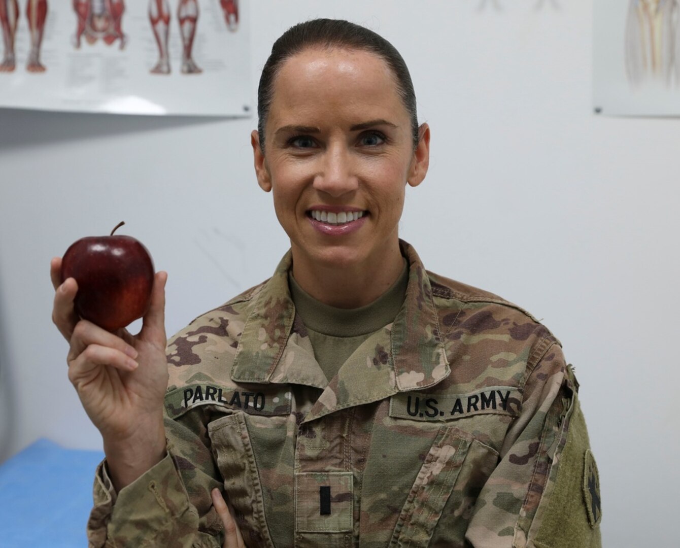 U.S. Army 1st Lt. Carolyn Parlato, assigned under the 3rd Medical Command, poses in a troop medical clinic in the Central Command Area of Responsibility on Aug. 20, 2020. Parlato serves as a Army Nutritionist or Military Occupation Specialty 65C deployed to the Middle East.