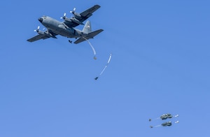 U.S. Paratroopers from the 173rd Airborne Brigade jump out of a U.S. Air Force C-130 Hercules during exercise Agile Wyvern at Cerklje ob Krki Air Base, Slovenia, Sept. 8, 2021. Sky Soldiers of 2nd Battalion, 503rd Parachute Infantry Regiment “The Rock,” merged with the 31st Fighter Wing’s Agile Wyvern operations as part of their own separate exercise to show small unit proficiency, tactical competence and to solidify partnerships with the Slovenian 74th Infantry Regiment. (U.S. Air Force photo by Senior Airman Brooke Moeder)