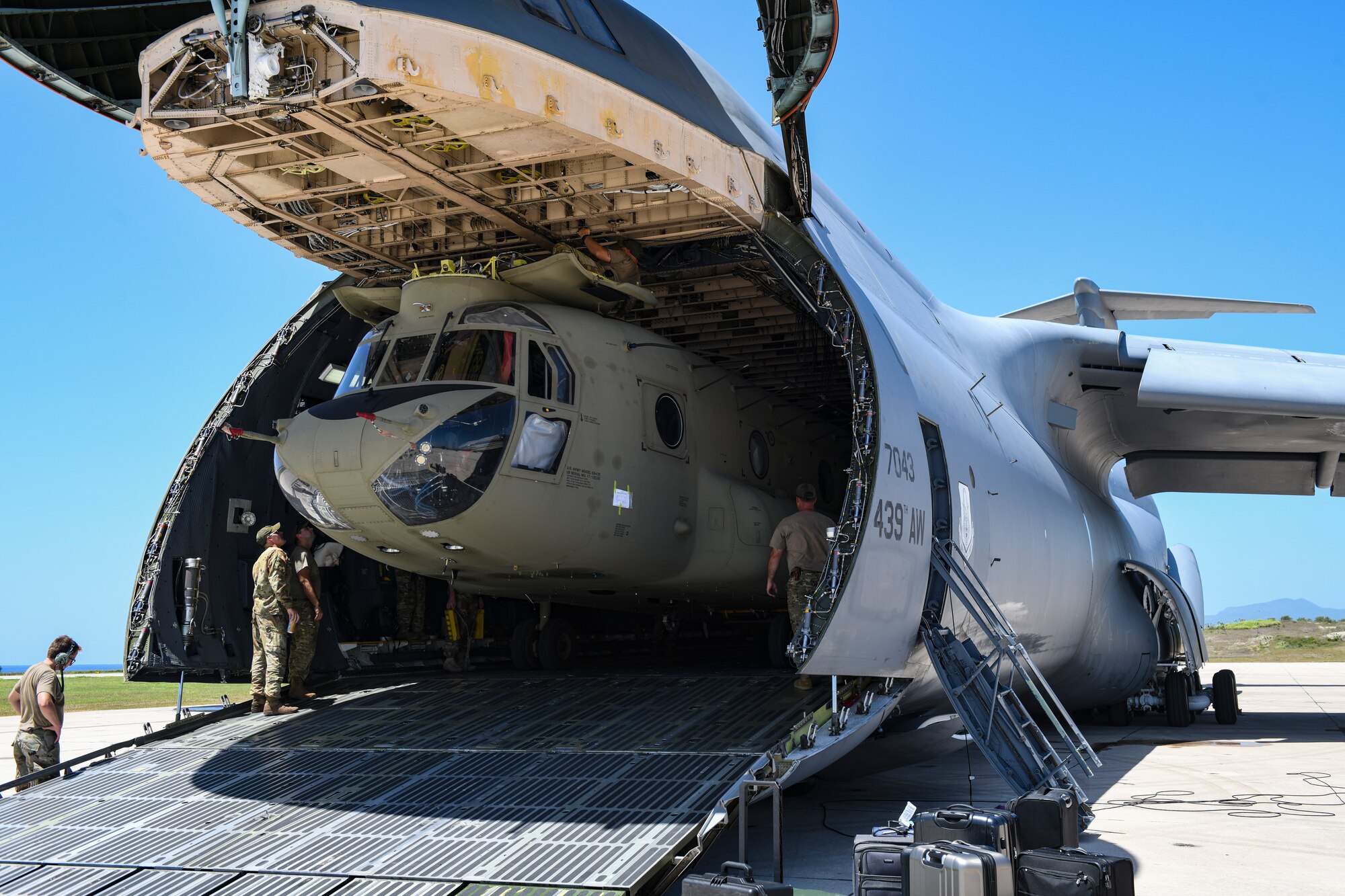 Photo of CH-47 Chinook in the back of a C-5 Super Galaxy.