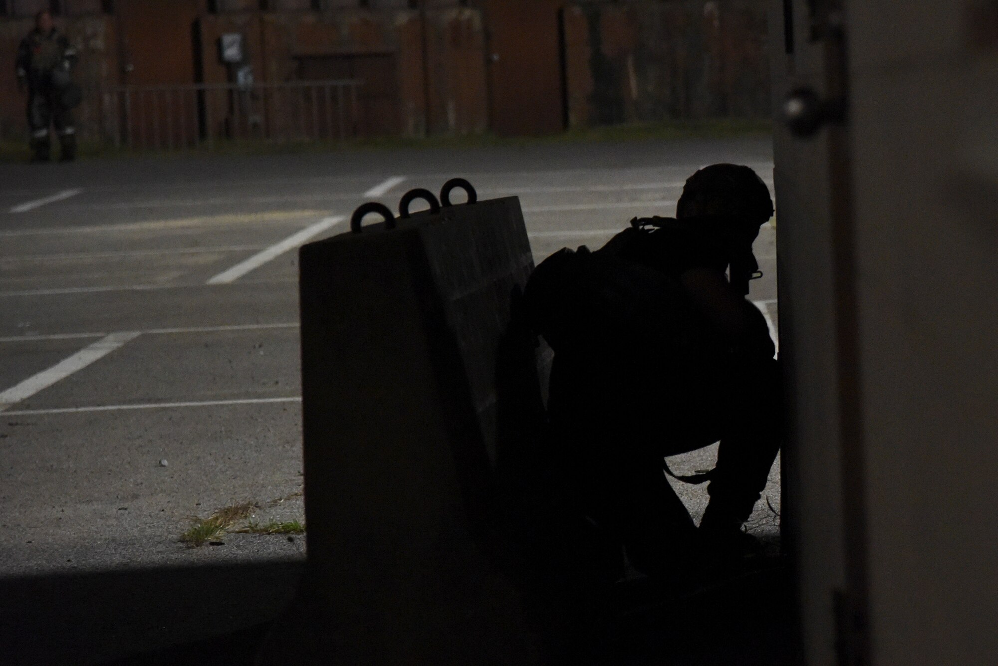 An Airman from the 51st Security Forces Squadron participates in a scenario during a routine training event