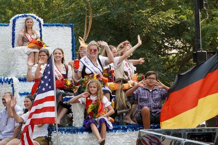 Former Maifest float queens wave to onlookers during Chicago’s 55th Annual Steuben Parade, September 11, 2021.