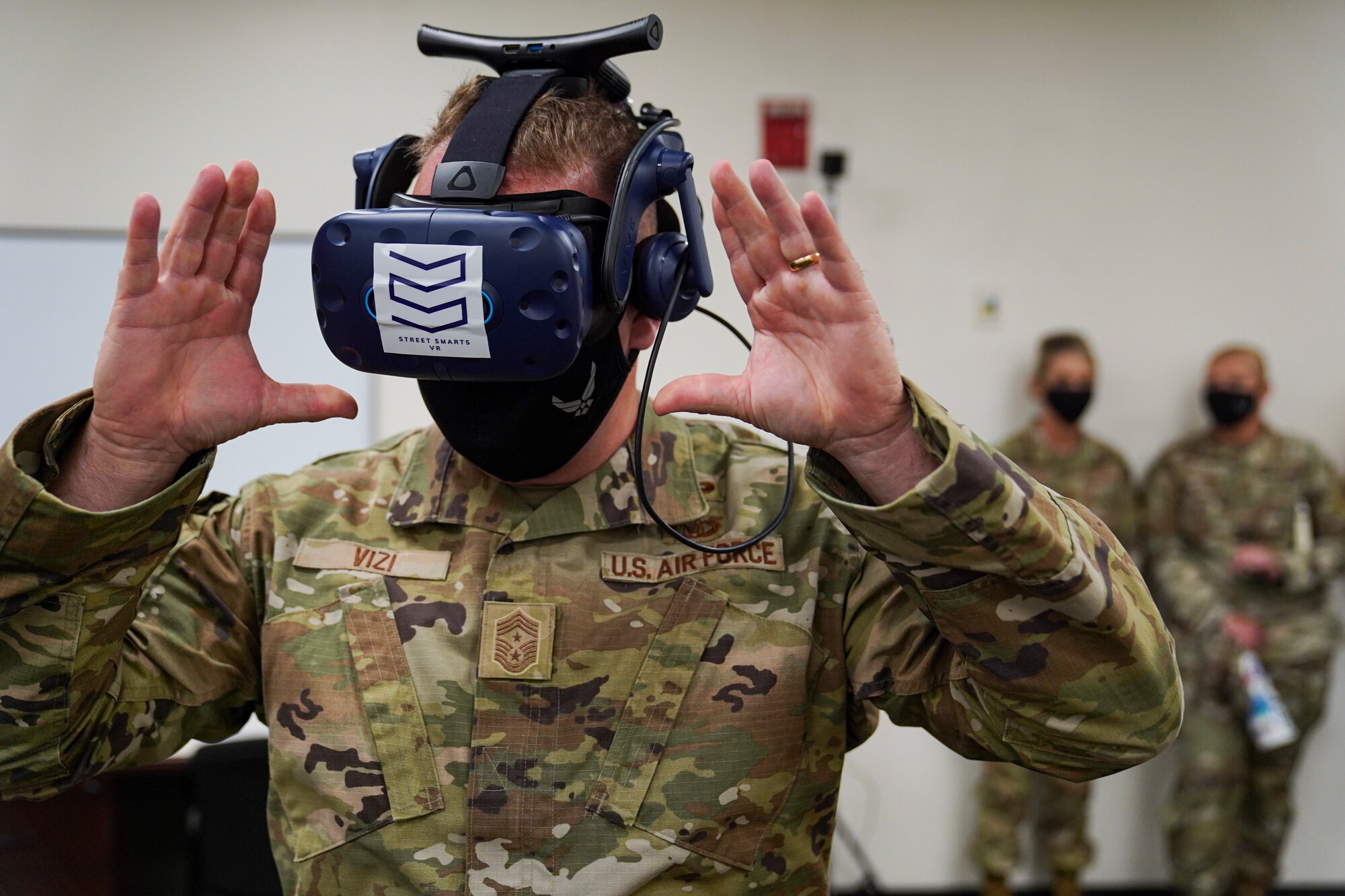 U.S. Air Force Chief Master Sgt. Adam Vizi, 2nd Air Force command chief, uses a virtual-reality system during an immersion tour at Keesler Air Force Base, Missisippi, September 13, 2021. The 2nd Air Force command team toured the 81st Training Wing as part of Maj. Gen. Michele C. Edmondson, 2nd Air Force commander, initial immersion visit to the installation since taking command of 2nd Air Force in July. (U.S. Air Force photo by Senior Airman Spencer Tobler)