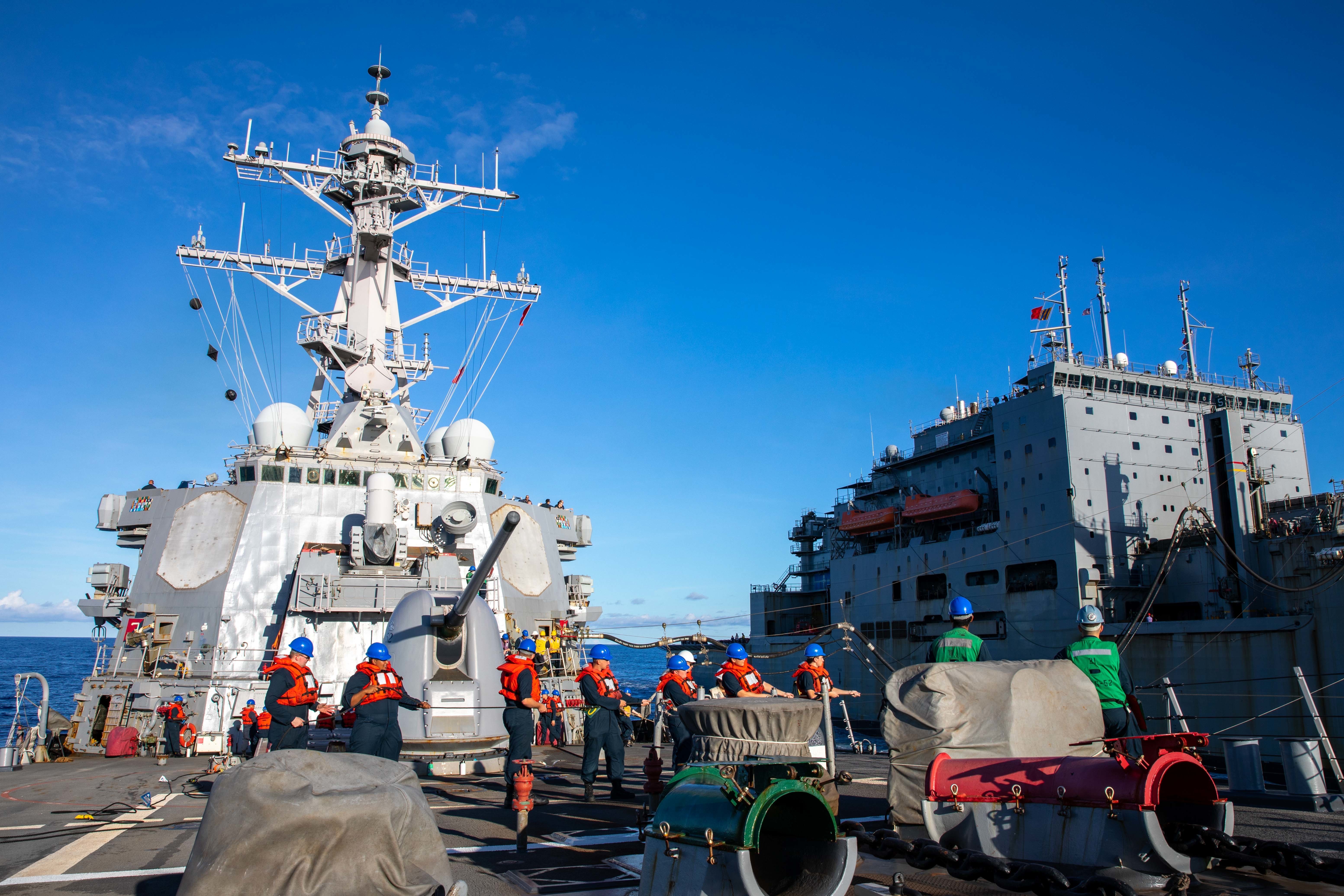 USS Barry (DDG 52) conducts a replenishment-at-sea with Lewis and Clark-class dry cargo and ammunition ship USNS Alan Shepard (T-AKE 3).