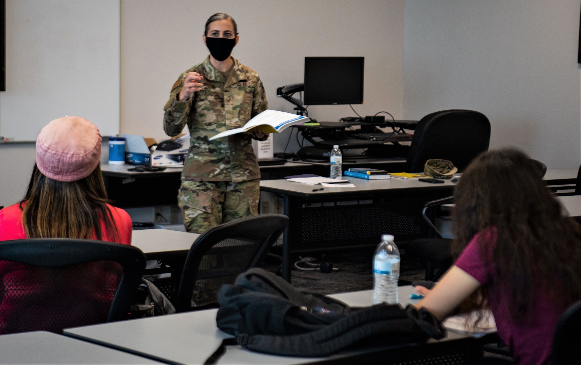 Tech. Sgt. Tia Morgan, Space Systems Command Senior Enlisted Leader’s executive assistant, instructs participants of the Financial Peace University course at Los Angeles Air Force Base, California, Sept. 1, 2021. Morgan dedicated over nine weeks teaching the course which focused on the basic understanding of finance and budgeting. (U.S. Space Force photo by Staff Sgt. Elijah Jackson)