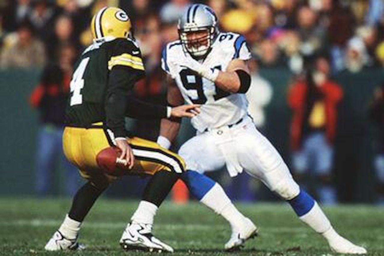 Football players play football.