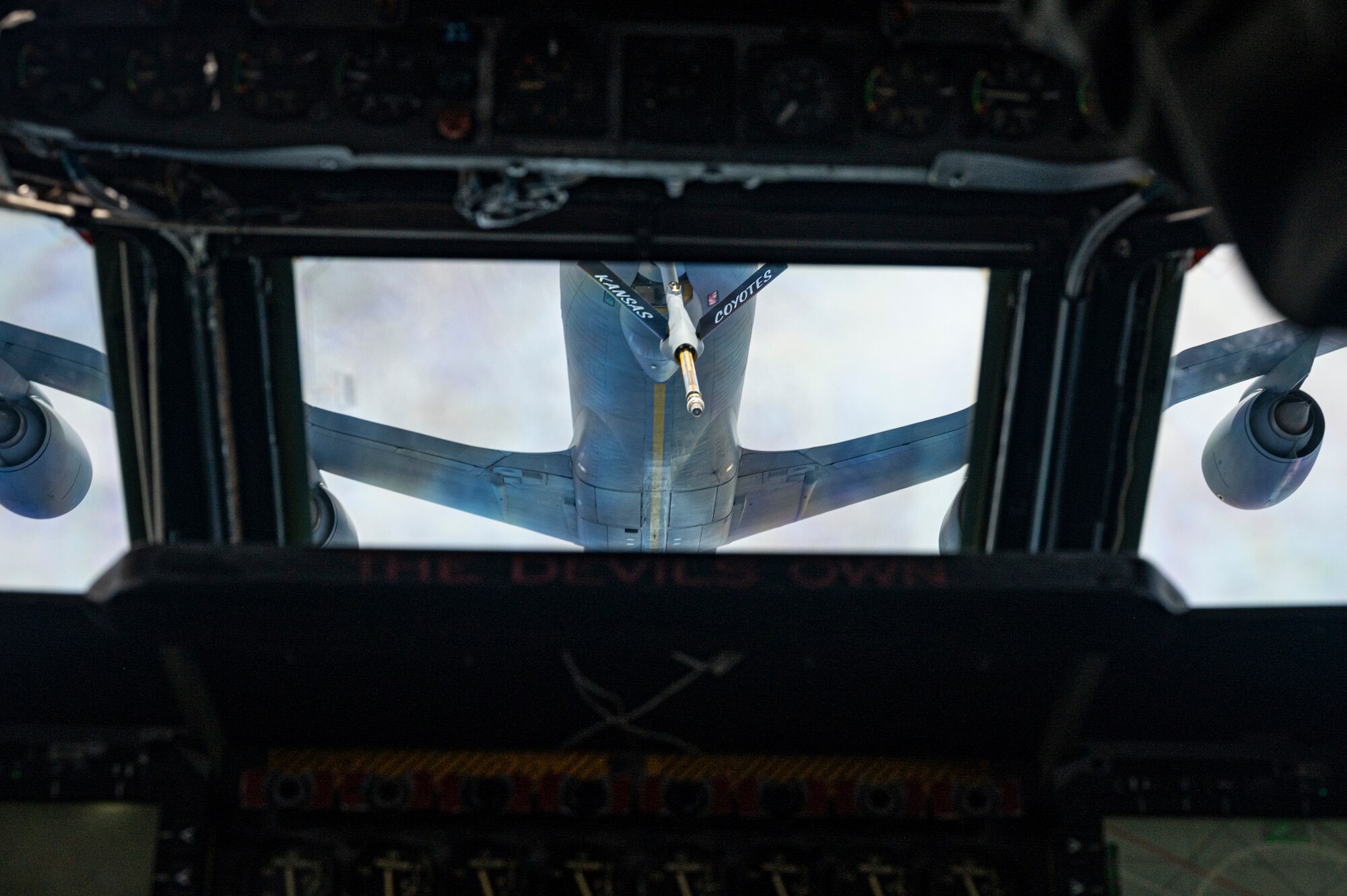 A U.S. Air Force KC-135 Stratotanker, assigned to the 117th Air Refueling Squadron, Kansas Air National Guard, prepares to refuel a B-52H Stratofortress, assigned to the 2nd Bomb Wing, Barksdale Air Force Base, Louisiana, over the Indo-Pacific region, during a Bomber Task Force mission, Sept. 14, 2021. The B-52 is a long range bomber with a range of approximately 8,800 miles, enabling rapid support of Bomber Task Force missions or deployments and reinforcing global security and stability. (U.S. Air Force photo by Staff Sgt. Devin M. Rumbaugh)