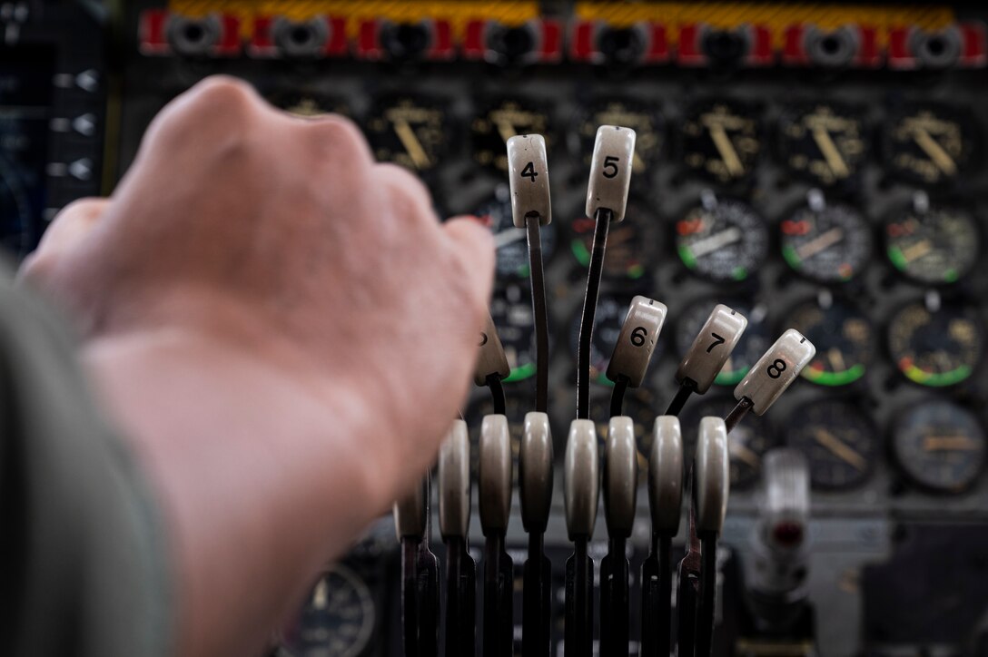 A U.S. Air Force aircrew member modulates the throttles of a B-52H Stratofortress, assigned to the 2nd Bomb Wing, Barksdale Air Force Base, Louisiana, over the Indo-Pacific region during a Bomber Task Force mission, Sept. 14, 2021. In line with the National Defense Strategy’s objectives of strategic predictability and operational unpredictability, the BTF enables a mix of different types of bombers to operate forward in the Indo-Pacific region from a broad array of overseas and Continental U.S. locations with greater operational resilience. (U.S. Air Force photo by Staff Sgt. Devin M. Rumbaugh)
