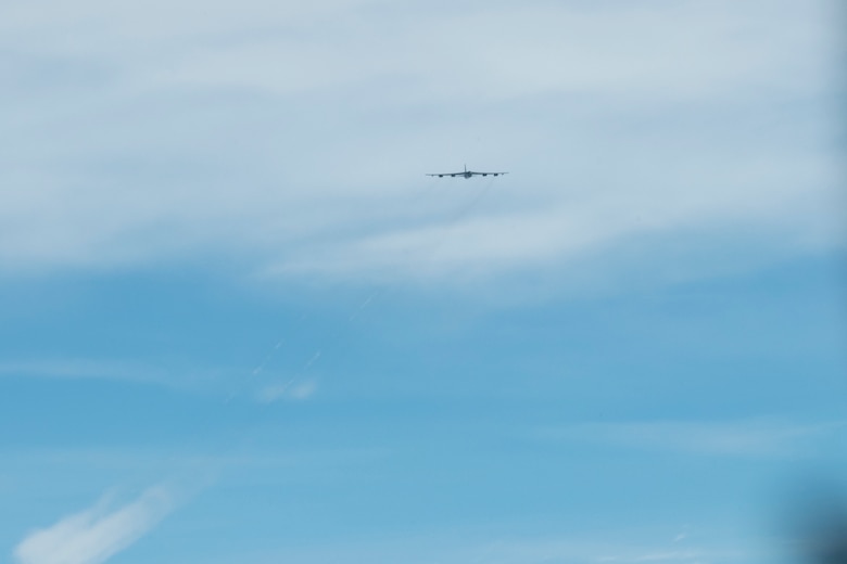 A U.S. Air Force B-52H Stratofortress, assigned to the 2nd Bomb Wing, Barksdale Air Force Base, Louisiana, flies past another B-52H during a Bomber Task Force mission over the Indo-Pacific region, Sept. 14, 2021. Evaluating readiness and forward positioning bomber aircraft ensures the Department of Defense can maintain operational and support capabilities to meet security obligations. (U.S. Air Force photo by Staff Sgt. Devin M. Rumbaugh)