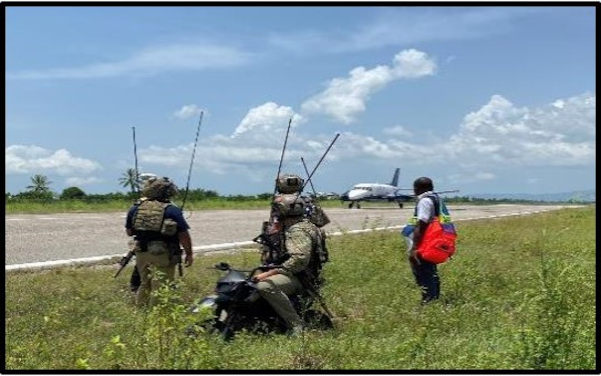 U.S. Air Force Special Tactics operators conduct a proof of concept landing with a C-146A Wolfhound, assigned to the 492nd Special Operations Wing, in a remote airfield in the western part of Haiti to determine the airfield's suitability to receive additional humanitarian aid supplies via fixed wing aircraft.