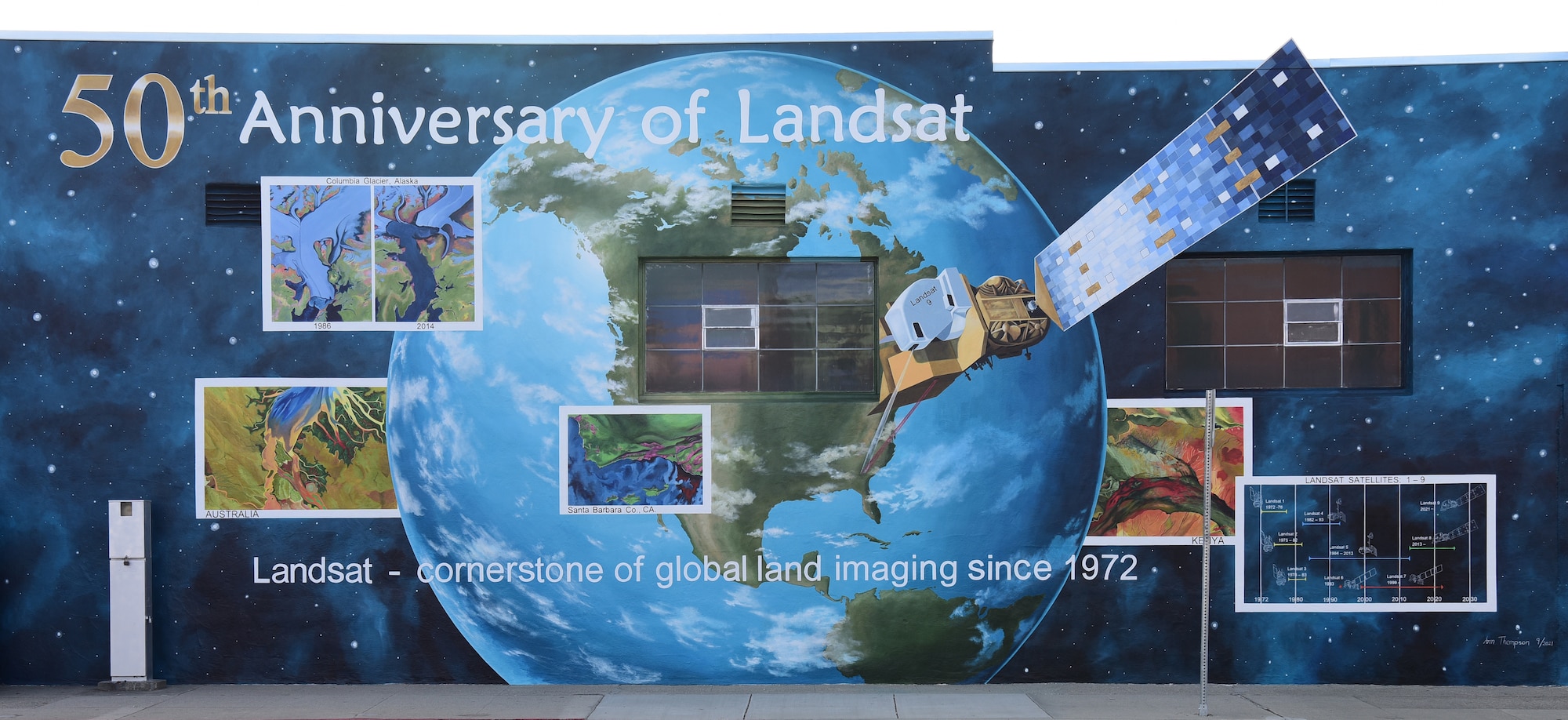 Ann Thompson, City of Lompoc Mural Society curator, started painting the earth of the mural on Ocean Blvd and I street June 27, 2021 in Lompoc, California. The mural will be implementing the history of the progression of the Landsat satellites numbers one through eight. (U.S. Space Force photo by Airman First Class Tiarra Sibley)