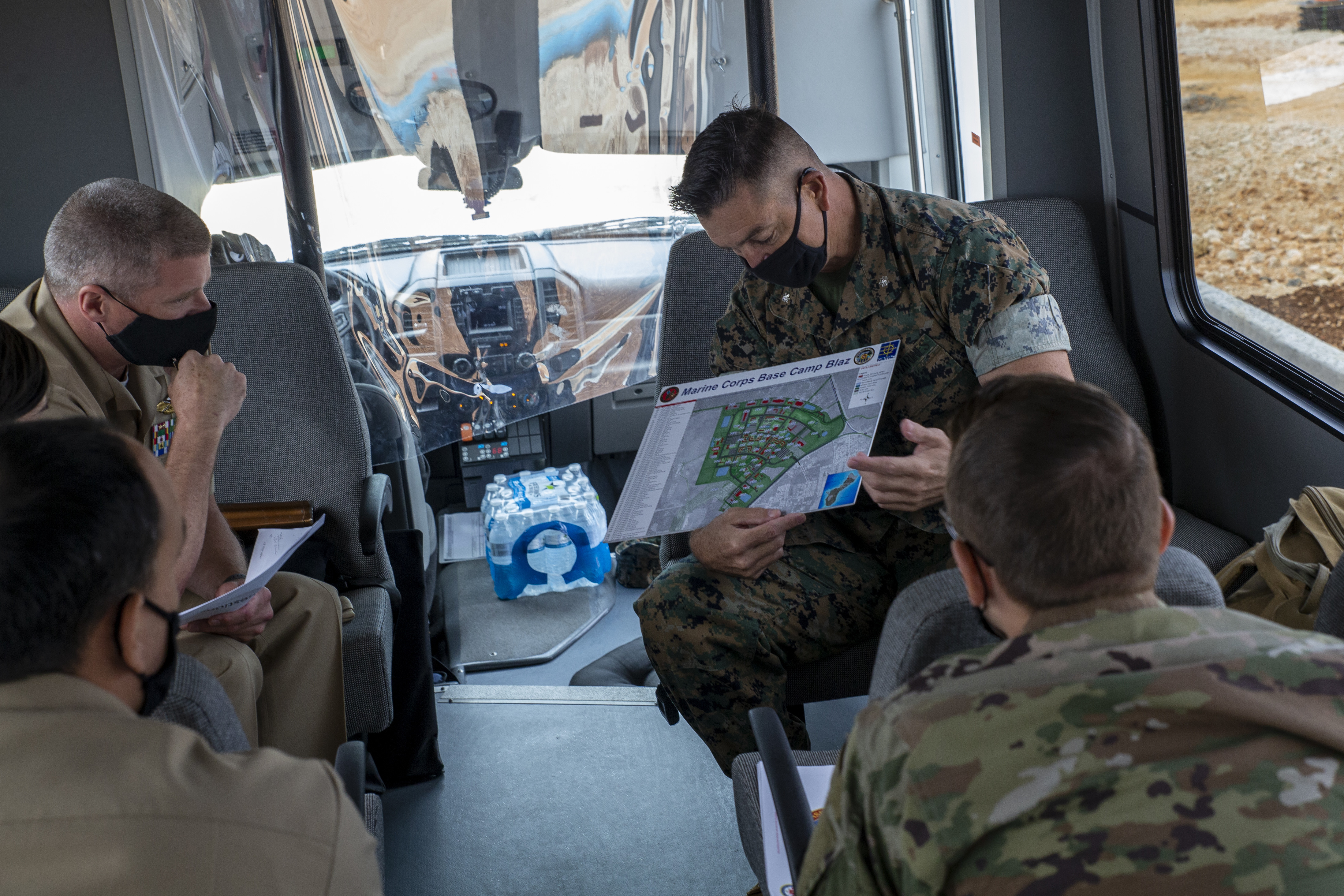 Lt. Col. Tate Buntz, the Marine Corps Base (MCB) Camp Blaz Operations Officer, briefs senior leaders from Naval Medical Forces Pacific, Navy Medicine Readiness and Training Command Guam, and 36th Medical Group during a visit to MCB Camp Blaz, Sept. 13, 2021.
