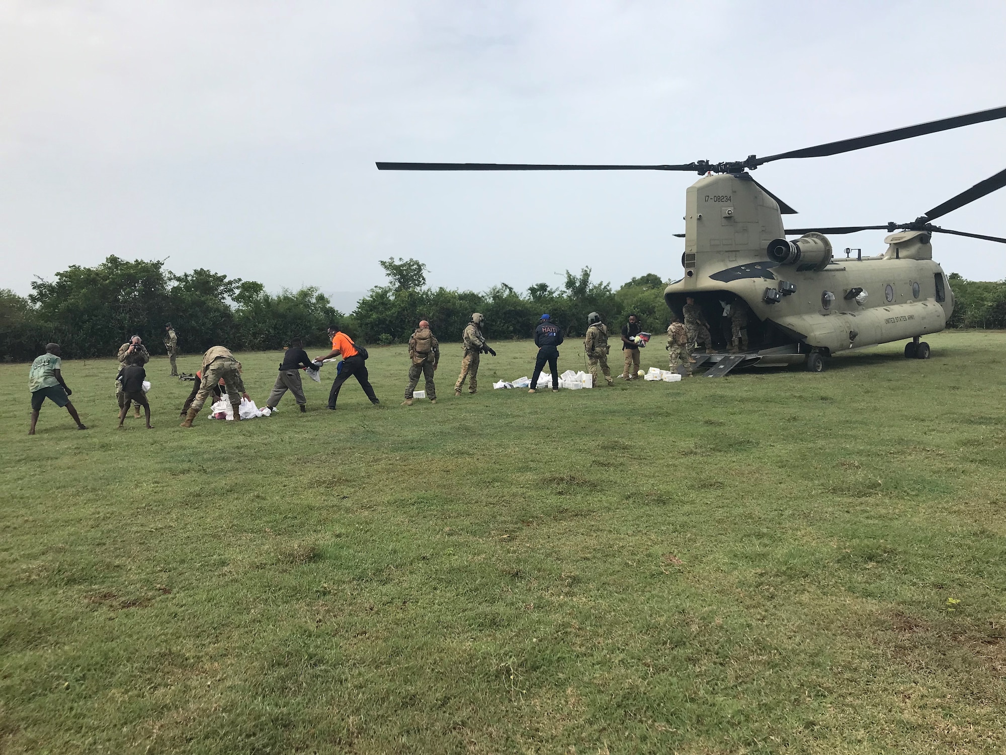 U.S. Air Force Special Tactics operators and other members of Joint Task Force-Haiti deliver humanitarian aid supplies to a remote part of the country. Special Tactics Airmen responded to a request to augment relief efforts in Haiti after a 7.2 magnitude earthquake hit the country Aug. 14, 2021.