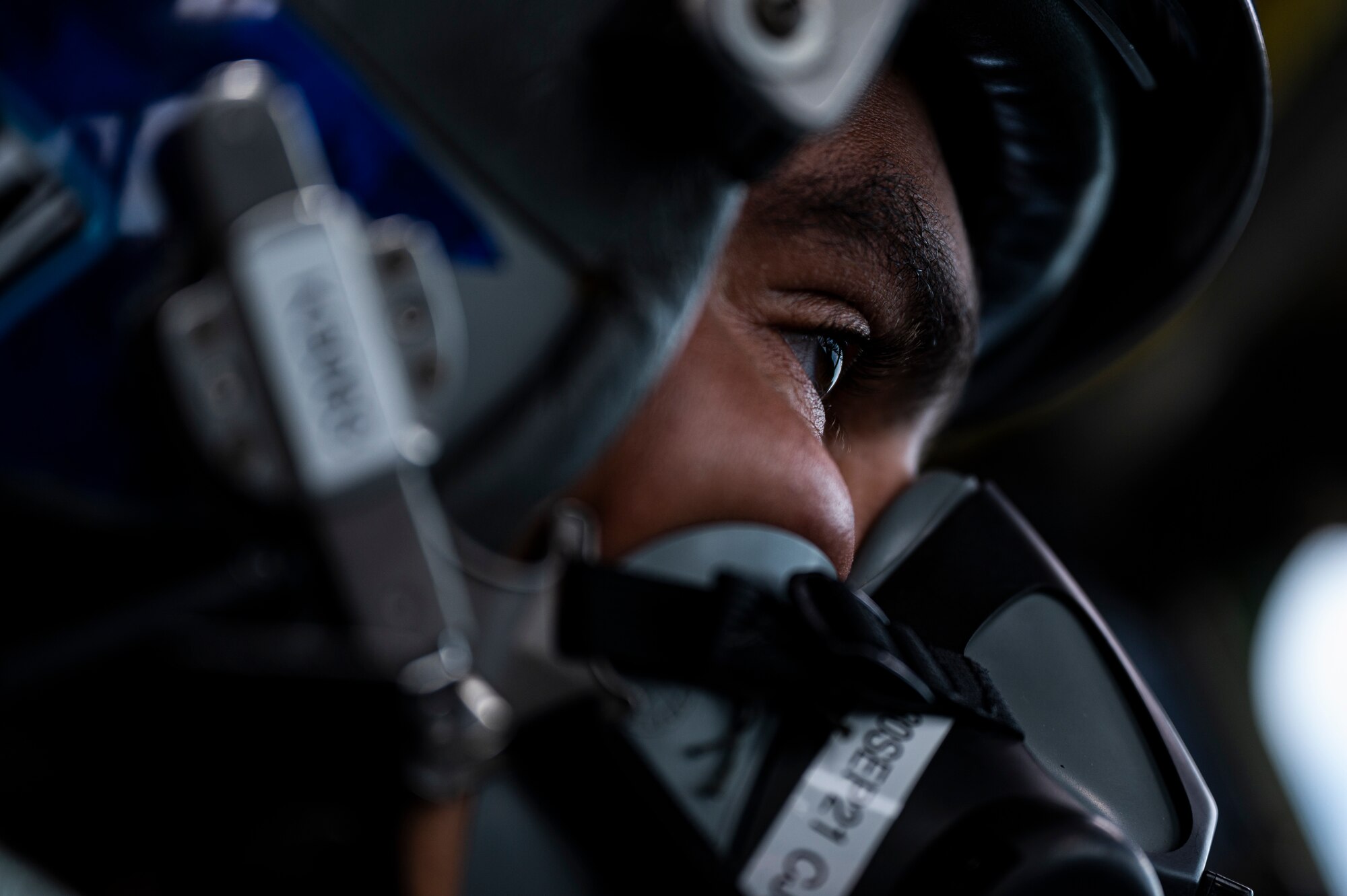 A U.S. Air Force aircrew member conducts checks on a B-52H Stratofortress, assigned to the 2nd Bomb Wing, Barksdale Air Force Base, Louisiana, over the Indo-Pacific region during a Bomber Task Force mission, Sept. 14, 2021. The U.S. Air Force is engaged, postured, and ready with credible force to assure, deter, and defend in an increasingly complex security environment. (U.S. Air Force photo by Staff Sgt. Devin M. Rumbaugh)