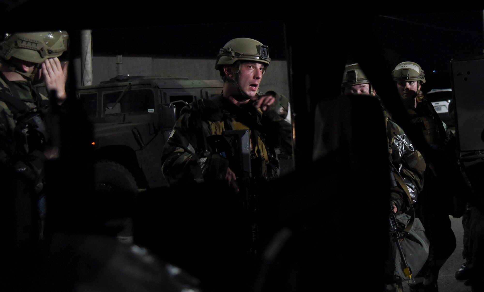 Senior Airman Alexander Westin, 51st Security Forces Squadron Defender, instructs teammates during a routine training event