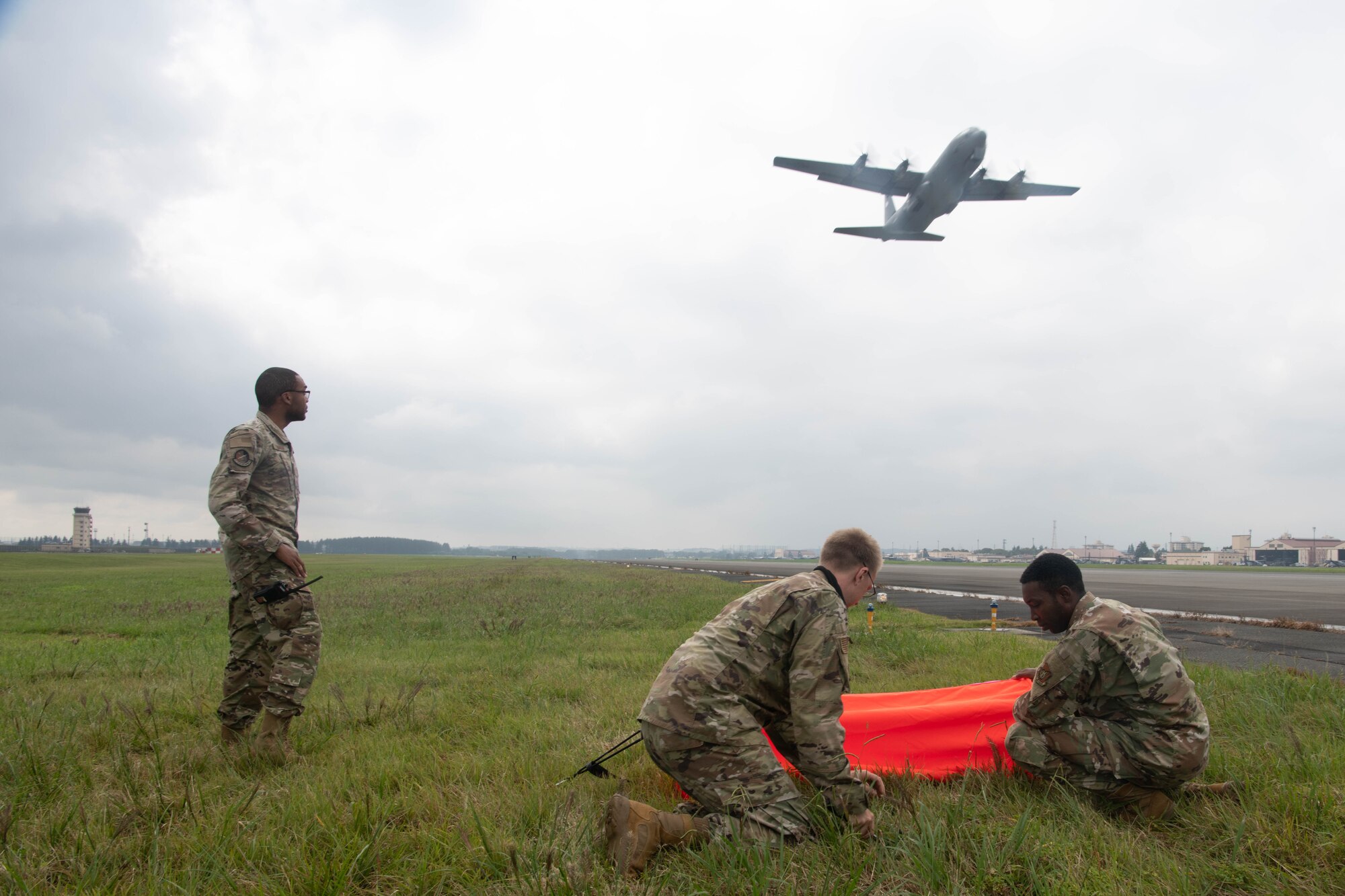 Airmen setting up a landing zone
