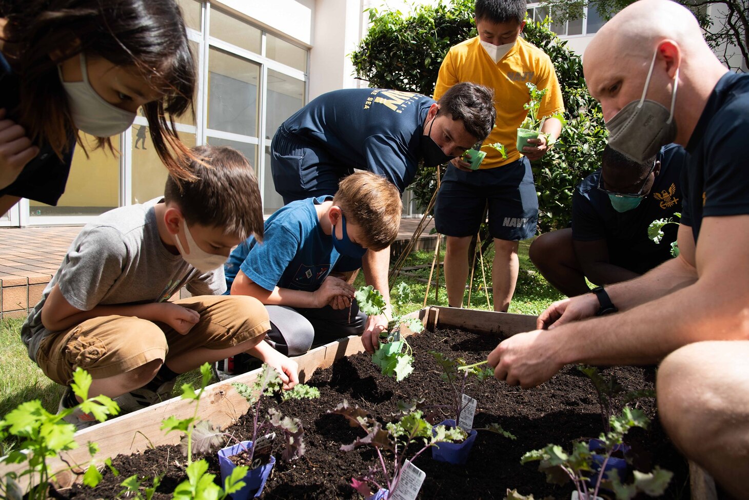 YOKOSUKA, Japan (Sept. 15, 2021) — Eleven Sailors from the Arleigh Burke-class guided missile destroyer USS The Sullivans (DDG 68) participate in a gardening project at the Sullivans School onboard Commander, Fleet Activities Yokosuka (CFAY). They worked together with 4th grade students to learn basic gardening skills. For more than 75 years, CFAY has provided, maintained, and operated base facilities and services in support of the U.S. 7th Fleet's forward-deployed naval forces, tenant commands, and thousands of military and civilian personnel and their families.