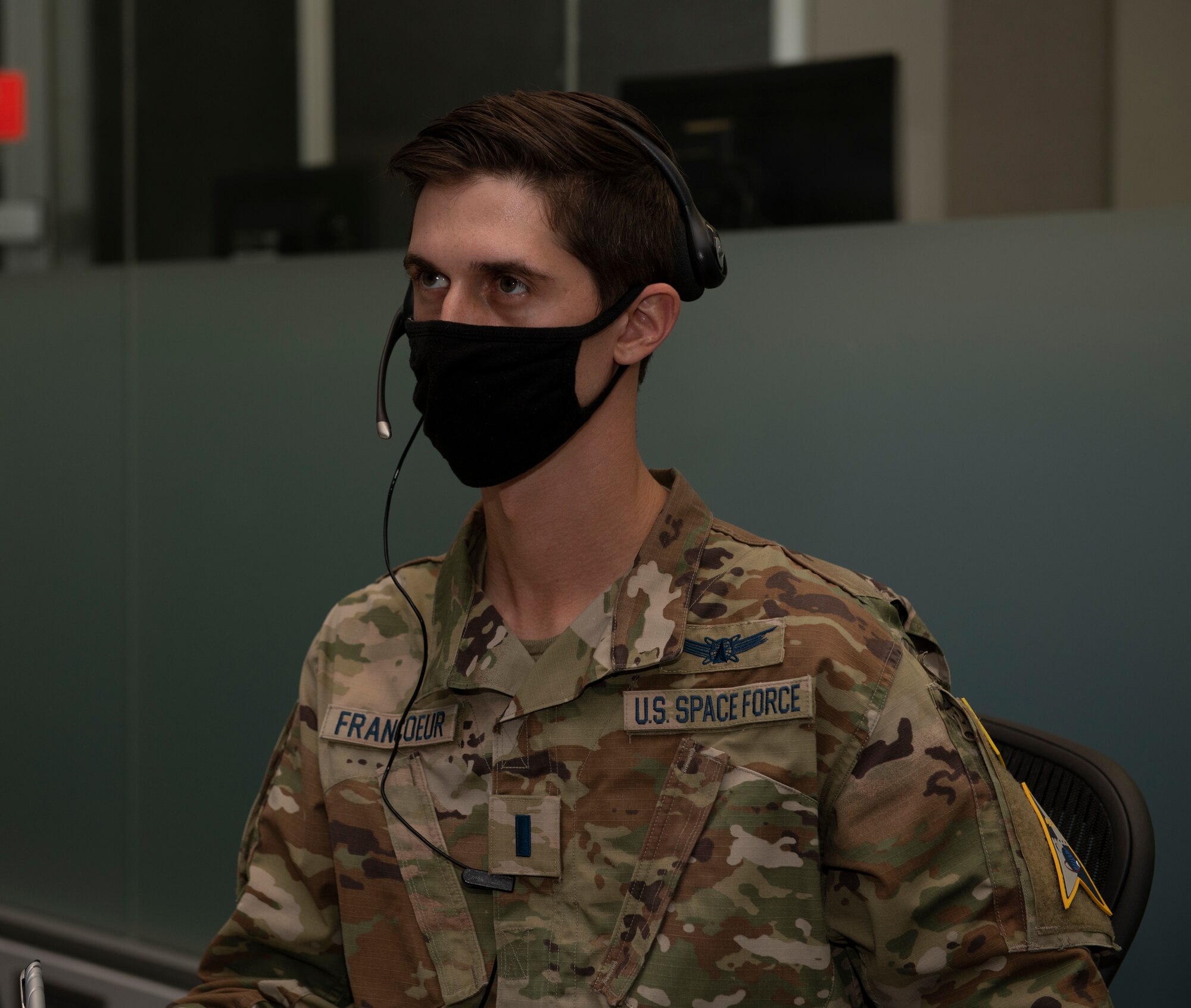 U.S. Space Force 1st Lt. Nicholas Francoeur, 1st Range Operations Squadron range operations commander, manages his team inside the Morrell Operations Center in support of the Inspiration4 launch Sept. 15, 2021, at Cape Canaveral Space Force Station, Florida. The MOC supports every space launch from CCSFS and Kennedy Space Center. (U.S. Space Force photo by Tech. Sgt. James Hodgman)