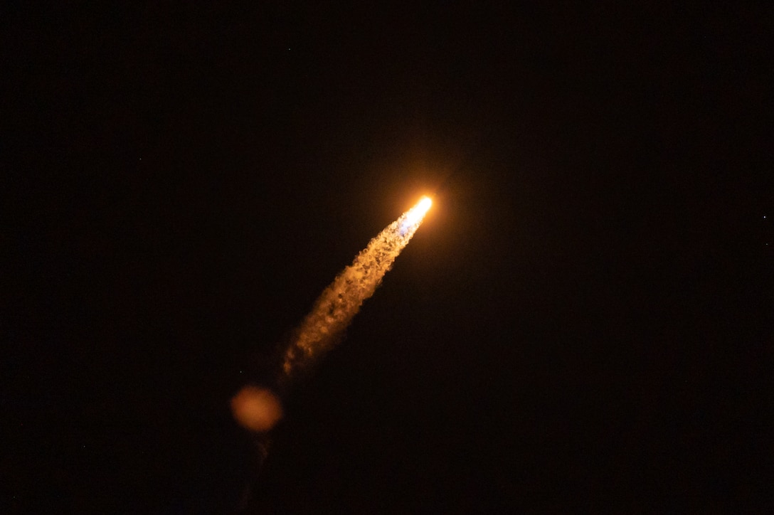 A Falcon 9 rocket launches Inspiration4 toward space Sept. 15, 2021, at Kennedy Space Center, Florida. Four private citizens were transported into orbit inside Space-X’s Dragon Resilience capsule. The crew, which is the first to be made up exclusively by private citizens, will orbit the Earth for three days. (U.S. Space Force photo by Airman 1st Class Thomas Sjoberg)