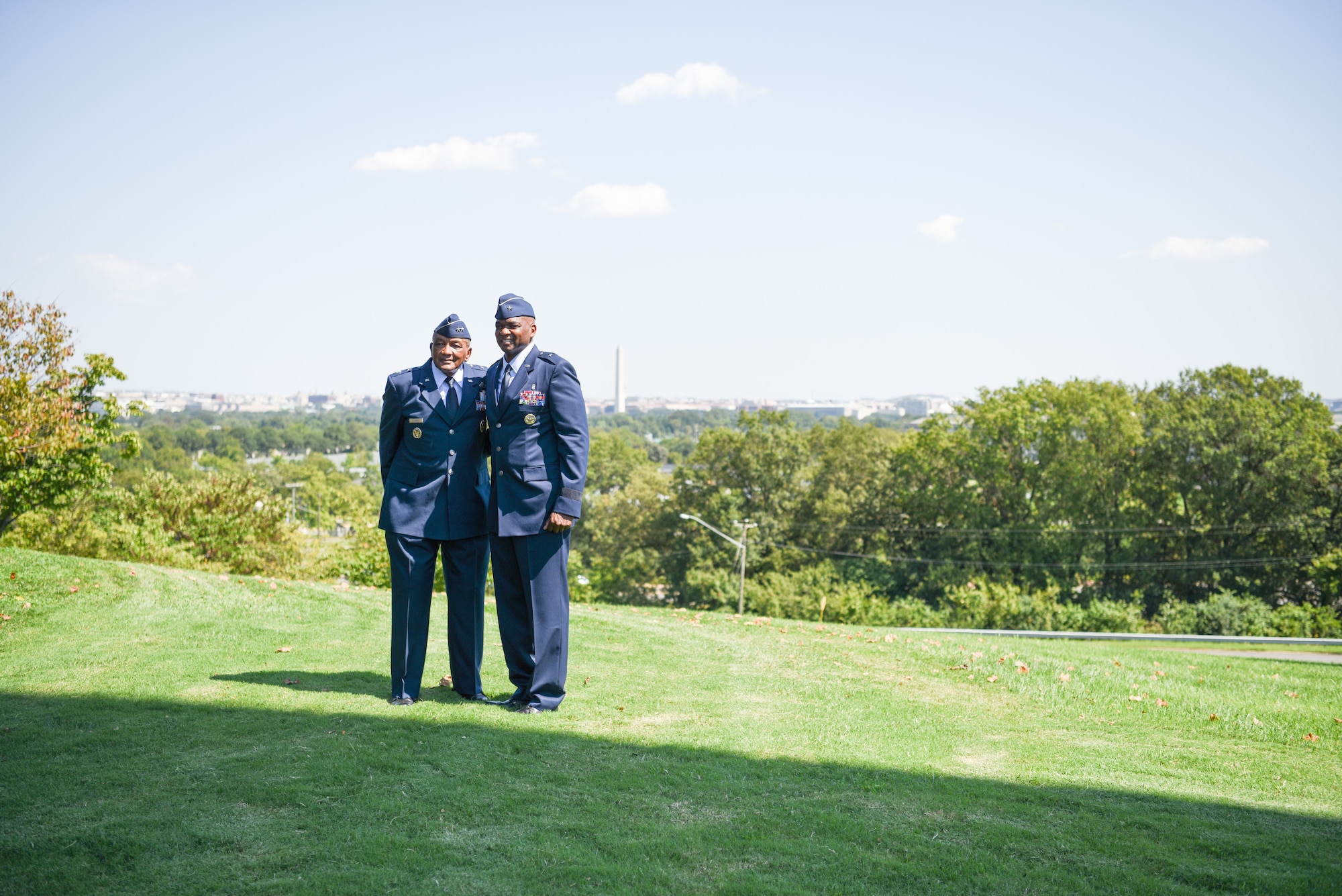 Image of two Airmen posing for a photo.