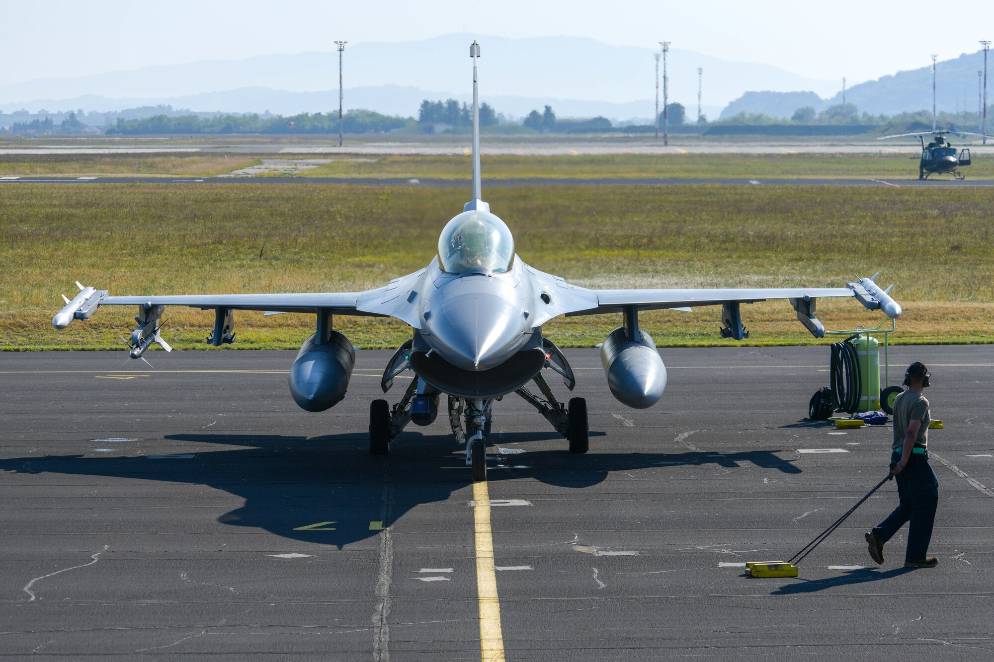 A U.S. Air Force F-16 Fighting Falcon assigned to the 510th Fighter Squadron prepares to participate in exercise Agile Wyvern at Cerklje ob Krki Air Base, Slovenia, Sept. 8, 2021. During Agile Wyvern, U.S. and Slovenian Armed Forces conducted Agile Combat Employment training. ACE ensures U.S. Air Forces in Europe-Air Forces Africa, along with allies and partners, are ready for potential short or no-notice contingencies by allowing forces to operate from locations with varying levels of capacity and support. (U.S. Air Force photo by Senior Airman Brooke Moeder)