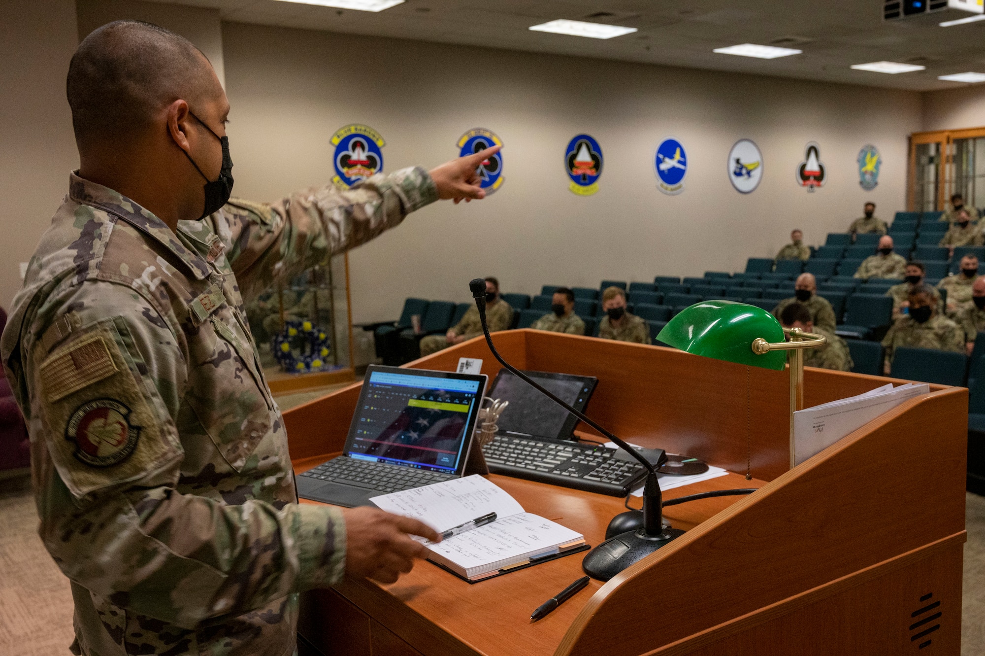 An Airman speaks to an audience