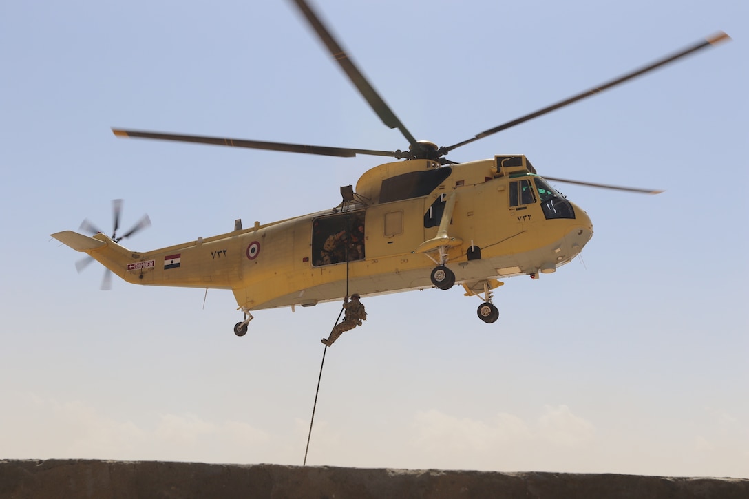 A Mi-17 transport helicopter moves into position to drop Egyptian Special Operations Forces into position during multi-lateral, Military Operations in Urban Terrain (MOUT) rehearsals at Bright Star 21, Sept. 13, in Mohamed Naguib Military Base, Egypt. (U.S. Army photo by Staff Sgt. Dean Gannon)