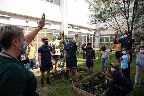 YOKOSUKA, Japan (Sept. 15, 2021) — Eleven Sailors from the Arleigh Burke-class guided missile destroyer USS The Sullivans (DDG 68) participate in a gardening project at the Sullivans School onboard Commander, Fleet Activities Yokosuka (CFAY). They worked together with 4th grade students to learn basic gardening skills. For more than 75 years, CFAY has provided, maintained, and operated base facilities and services in support of the U.S. 7th Fleet's forward-deployed naval forces, tenant commands, and thousands of military and civilian personnel and their families.