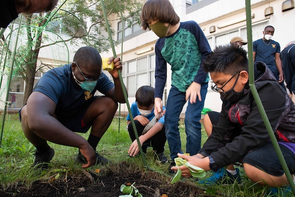 YOKOSUKA, Japan (Sept. 15, 2021) — Eleven Sailors from the Arleigh Burke-class guided missile destroyer USS The Sullivans (DDG 68) participate in a gardening project at the Sullivans School onboard Commander, Fleet Activities Yokosuka (CFAY). They worked together with 4th grade students to learn basic gardening skills. For more than 75 years, CFAY has provided, maintained, and operated base facilities and services in support of the U.S. 7th Fleet's forward-deployed naval forces, tenant commands, and thousands of military and civilian personnel and their families.