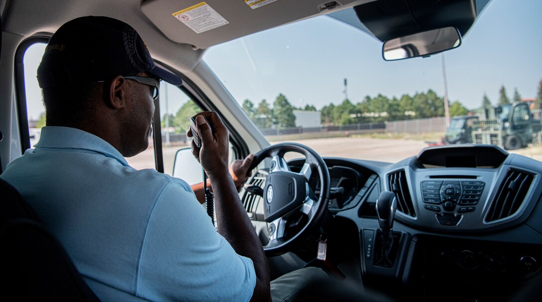 Taxi driver answering a request on his dispatch