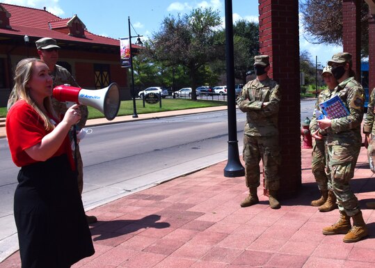 Laurin Kocurek, Abilene Chamber of Commerce vice president of operations and communications, gives a tour of the many places in downtown Abilene, Texas, Sept. 1, 2021.